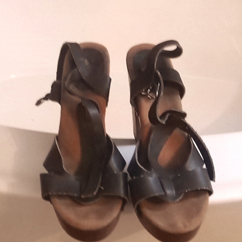 Open-faced buckle up heels